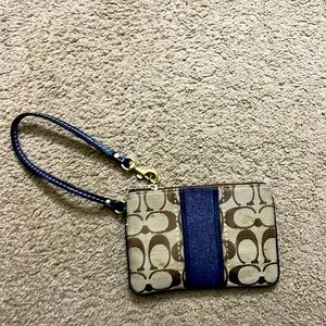 Coach brown and navy wristlet